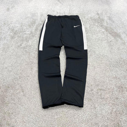 Vintage y2k Nike tracksuit bottoms black Lightweight swoosh logo running track pants