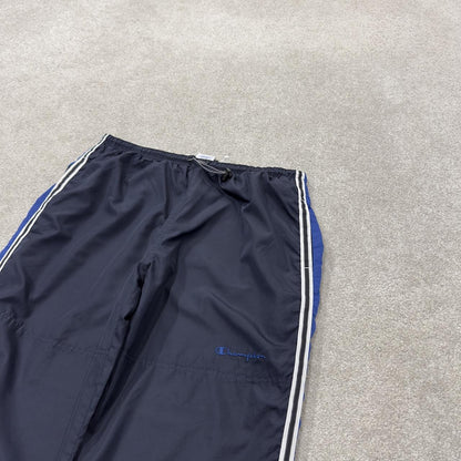 Baggy Y2K Champion tracksuit bottoms navy Loose leg lined 2000s style casual track pants