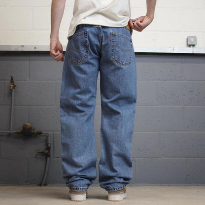 Blue Levis 505 jeans W35L32 blue loose straight leg y2k style pants red tab logo