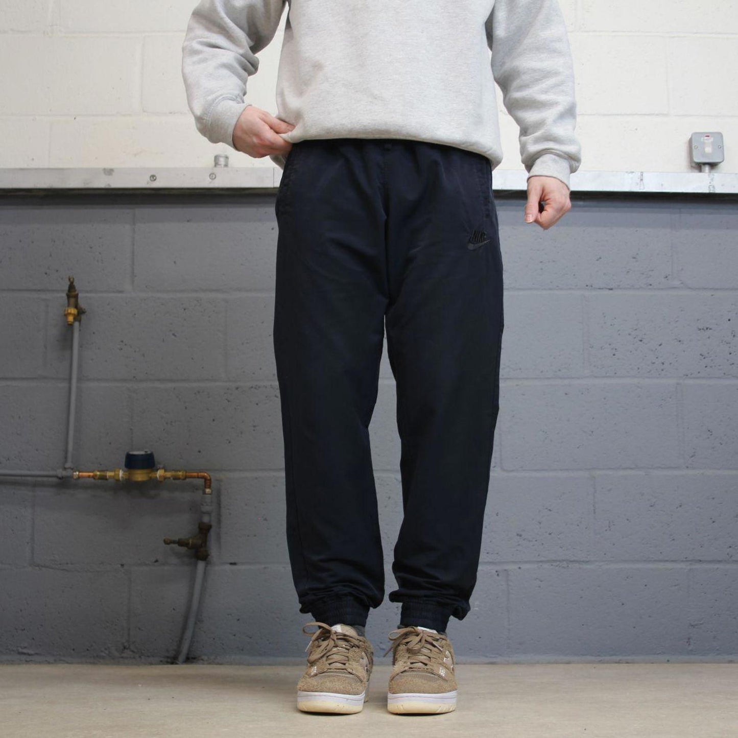 Y2k Nike tracksuit bottoms loose navy Loose unlined embroidered cuffed track pants