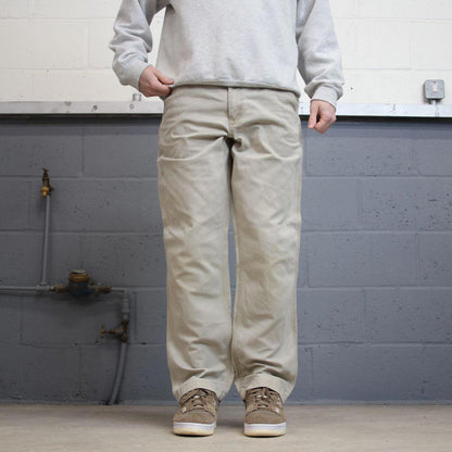 Beige Carhartt carpenter pants W34L32 relaxed fit 90s skater style cargos