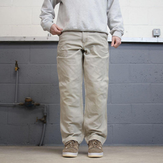 Beige Carhartt carpenter pants W34L32 relaxed fit 90s skater style cargos