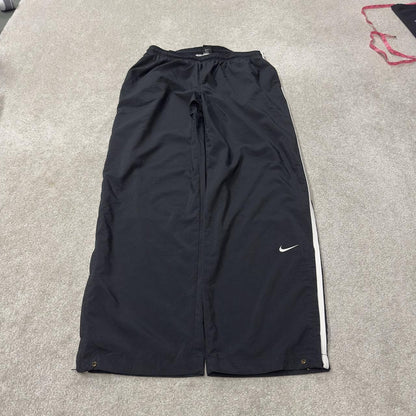 Nike extra baggy tracksuit bottoms wide leg black Nike Team lined embroidered stripe track pants