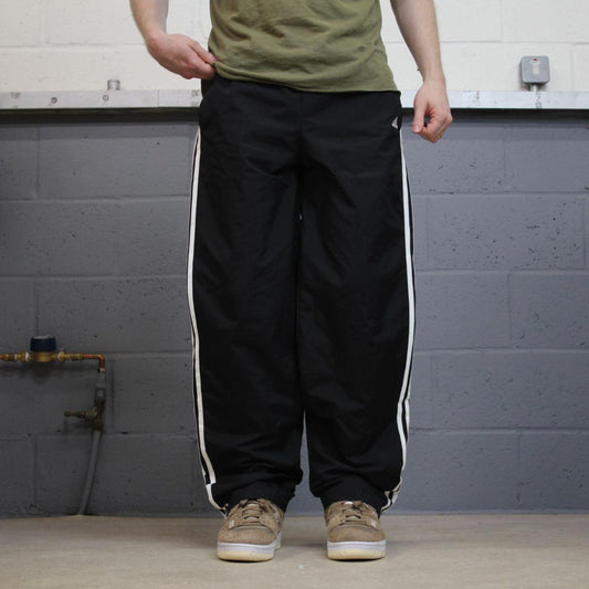 Baggy Adidas tracksuit bottoms wide leg black Loose soft lined embroidered side stripe track pants