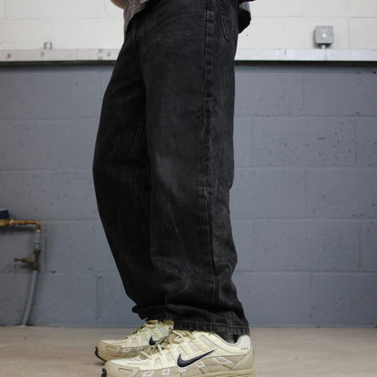 Black Levi’s 550 jeans Y2K denim Levi’s straight leg 2000s style pants red tab logo
