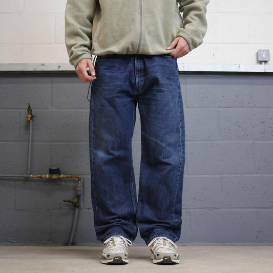 Vintage Y2K Levi’s 505 jeans blue Straight leg 00s style denim pants red tab logo