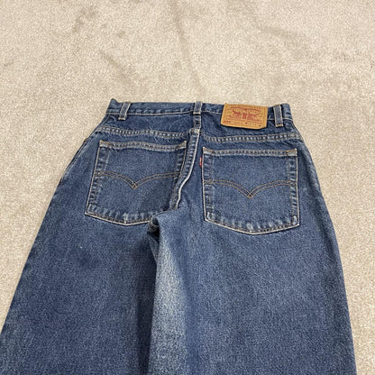 Y2K vintage Levi’s 550 jeans W26L31 blue Relaxed fit tapered leg 5 pocket pants red tab logo