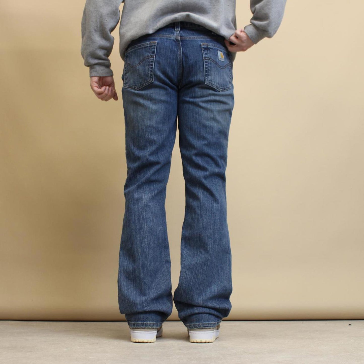 Blue Carhartt jeans size 12 (W34) traditional fit bootcut denim jeans patch logo