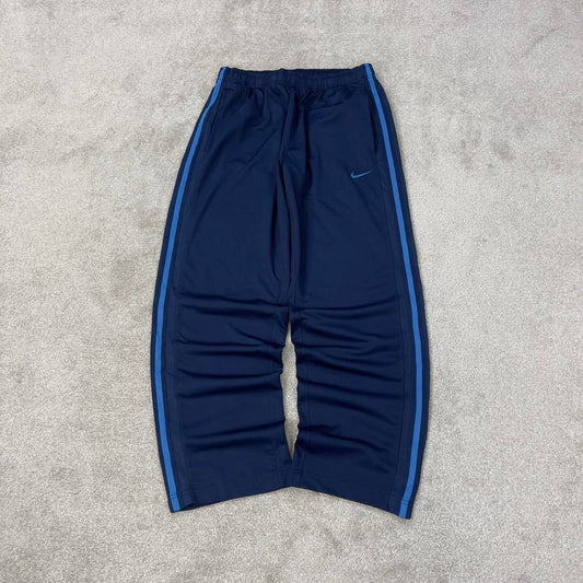 Baggy Nike Trackies Large Navy loose wide leg y2k style joggers embroidered logo side stripe design