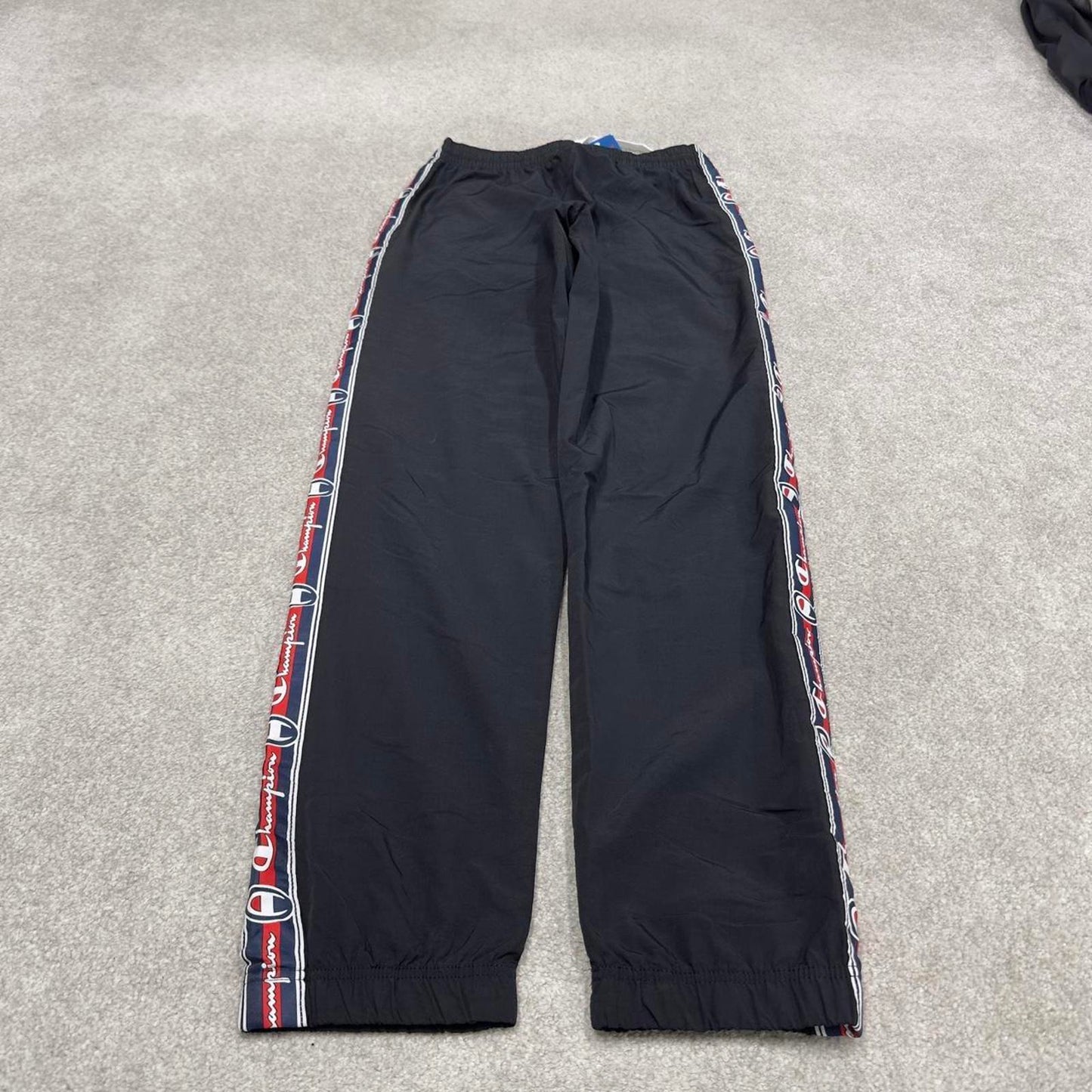 Vintage Champion tracksuit bottoms y2k style black joggers embroidered side stripe track pants