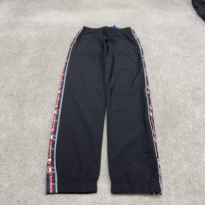 Vintage Champion tracksuit bottoms y2k style black joggers embroidered side stripe track pants