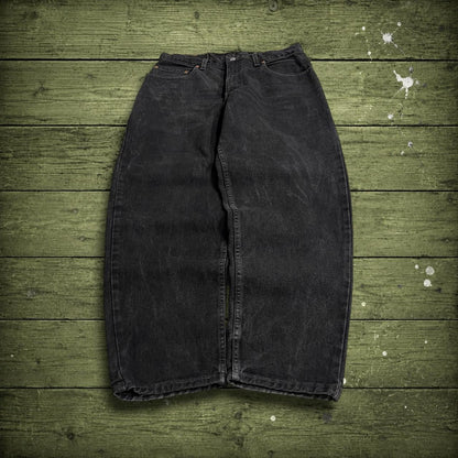 Vintage Levi's 560 jeans y2k black Loose fit denim pants red tab logo