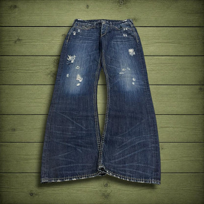 Y2K Guess bootcut jeans W33L34 blue ripped denim Loose bootcut pants with stitch design and pockets