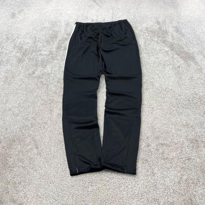 Vintage y2k Nike tracksuit bottoms black Lightweight swoosh logo running track pants