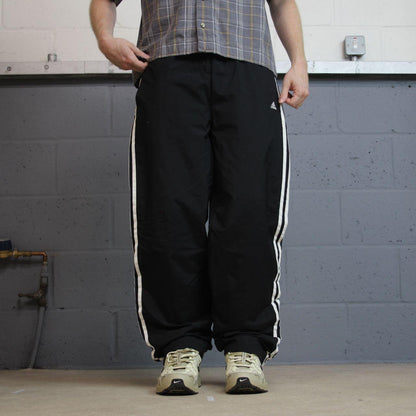 Y2K Adidas tracksuit bottoms loose leg black M Loose lined side stripe embroidered logo track pants