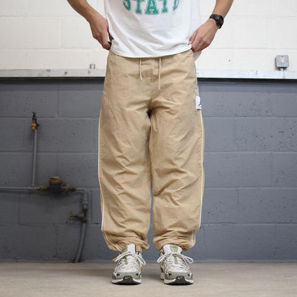 Air Jordan Trackies Large beige mesh lined loose sportswear floaty leg joggers