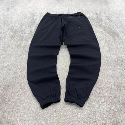 Black Nike tracksuit bottoms Medium y2k style sportswear track pants slim cuffed