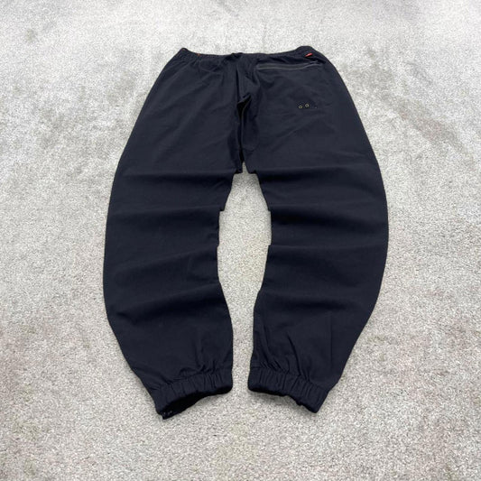 Black Nike tracksuit bottoms Medium y2k style sportswear track pants slim cuffed