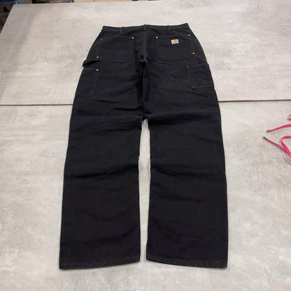 Black Carhartt double knee carpenter jeans W34L34 90s style thick canvas loose leg skater cargos