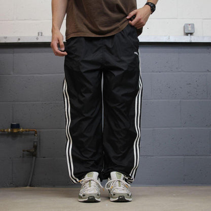 Adidas tracksuit bottoms loose black Loose floaty leg embroidered side stripe track pants