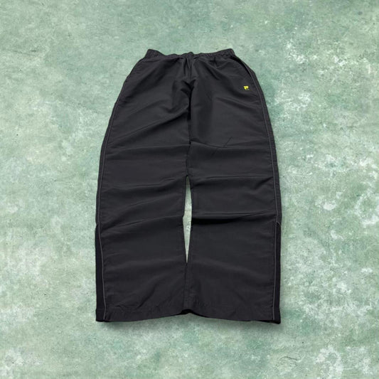 Vintage y2k FILA tracksuit bottoms black Loose floaty leg print track pants ankle zips