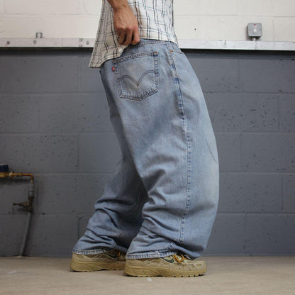 Baggy Levi’s 560 jeans y2k W40L30 blue Loose leg comfort fit denim 2000s style red tab logo jeans