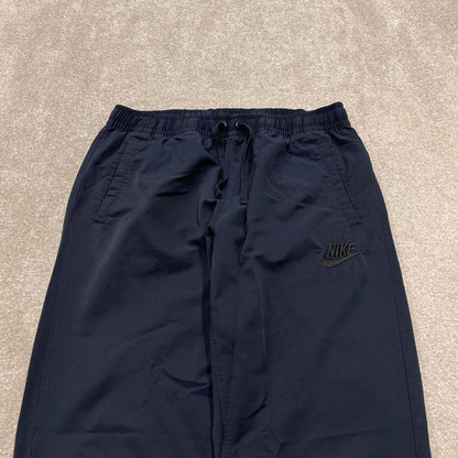Y2k Nike tracksuit bottoms loose navy Loose unlined embroidered cuffed track pants