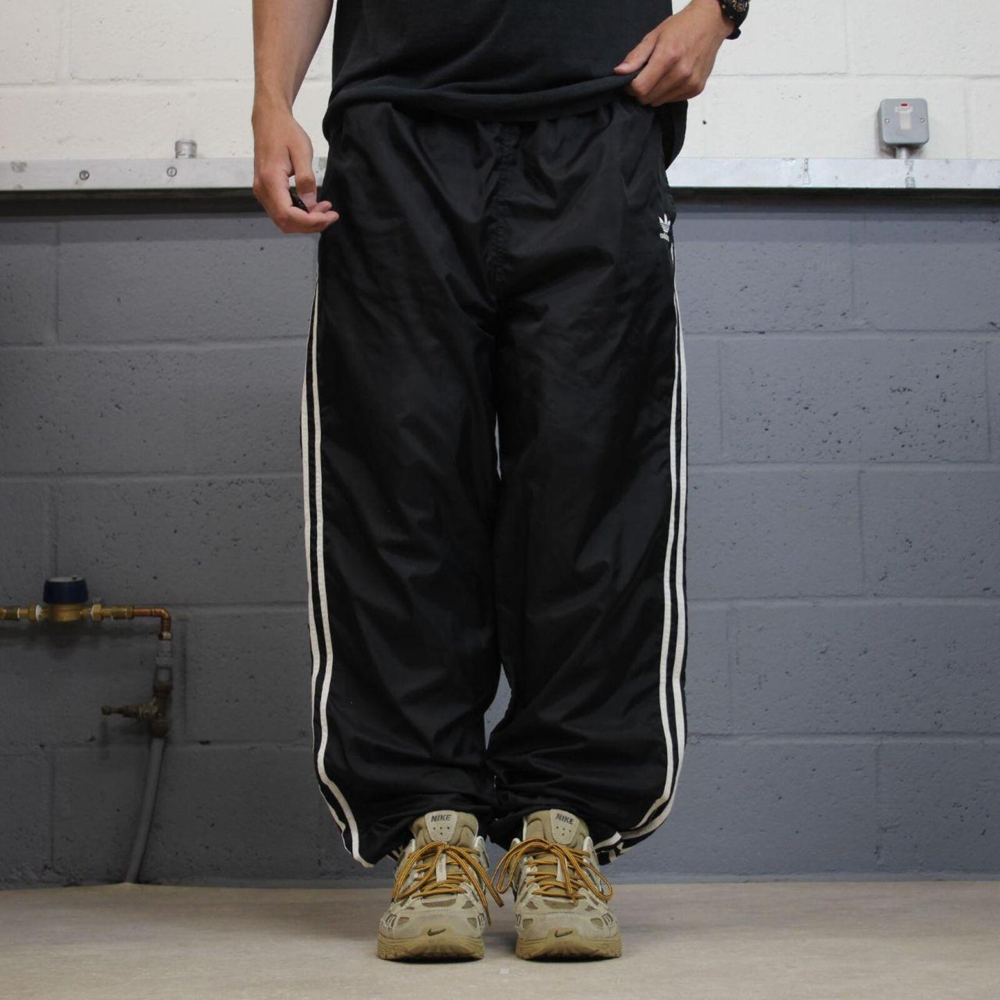 Vintage Adidas tracksuit bottoms loose black Loose floaty embroidered side stripe track pants