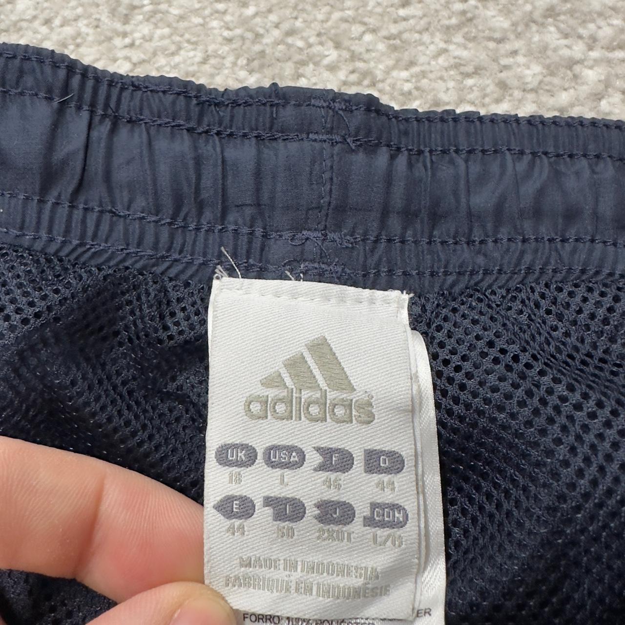 Baggy women’s Y2K Adidas tracksuit bottoms navy mesh lined side stripe embroidered logo track pants