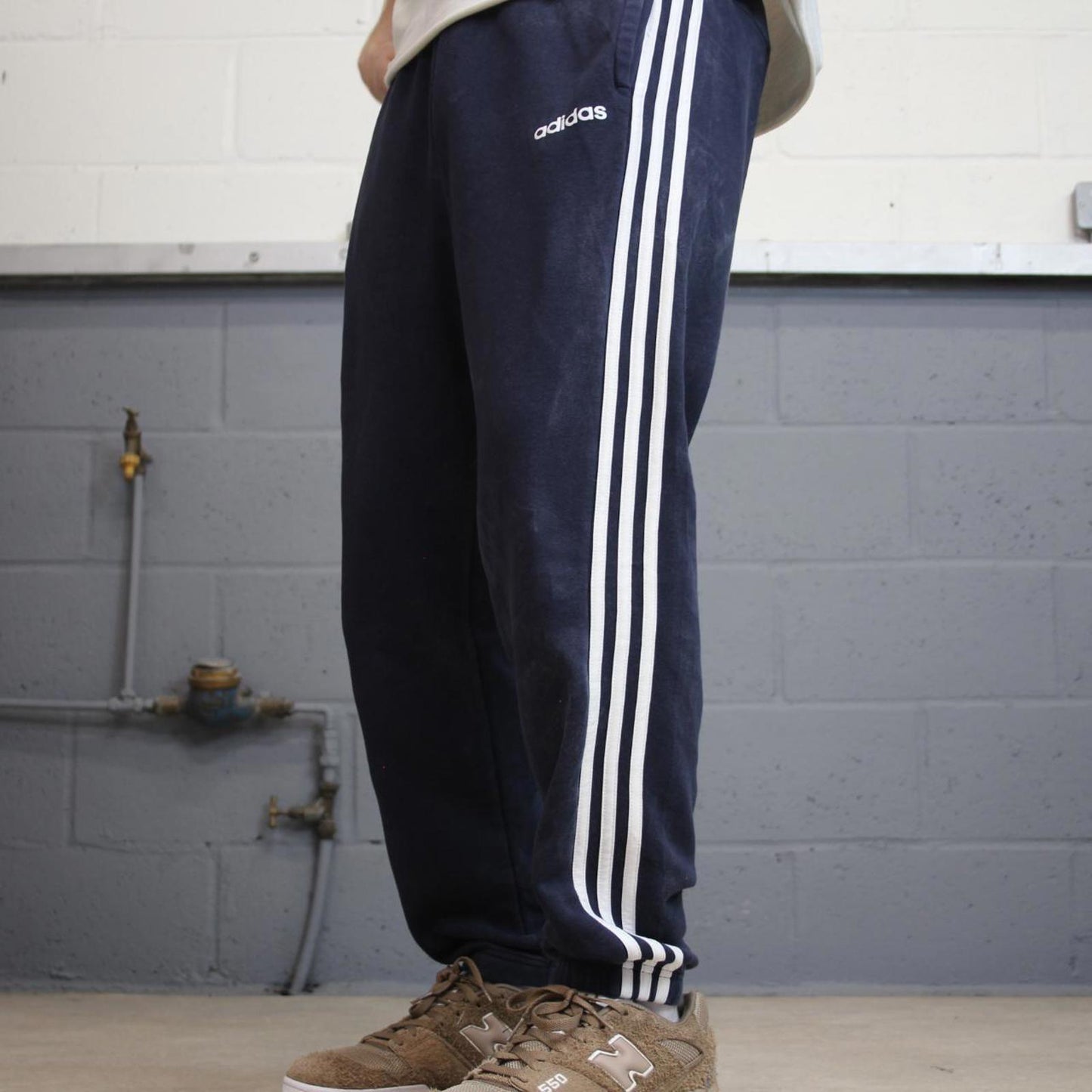 Vintage navy Adidas joggers M y2k style sportswear track pants side stripe design