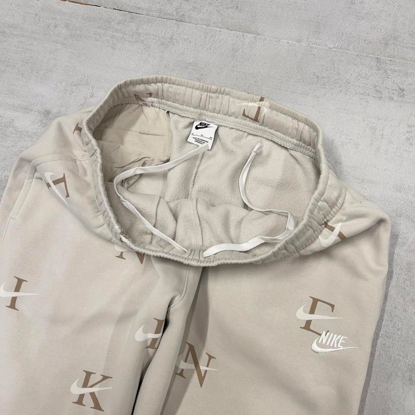 Y2k beige Nike joggers XL loose sweatpants cuffed legs embroidered logo