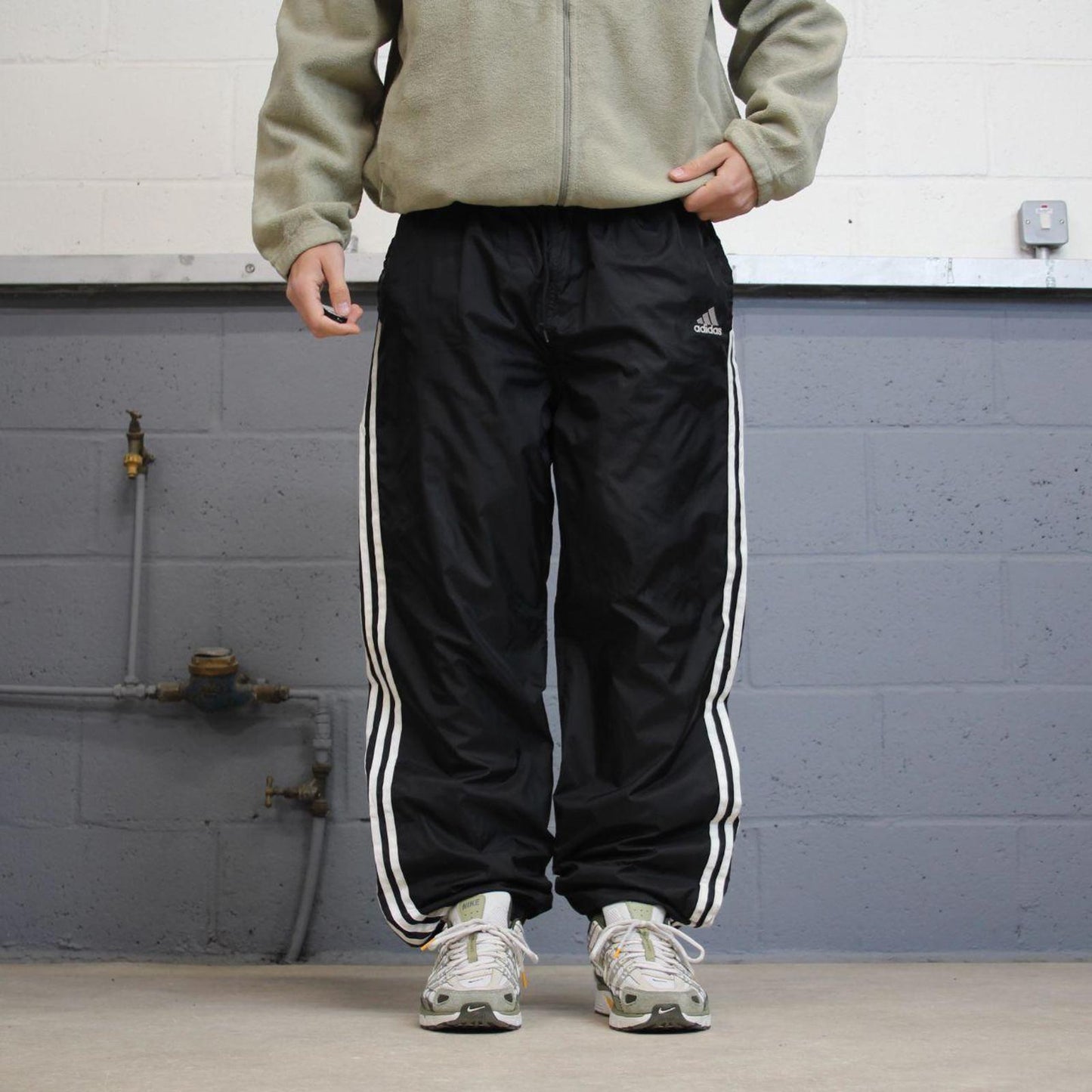 Black Adidas tracksuit bottoms Large y2k style sportswear track pants side stripe design