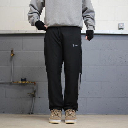 00s Nike tracksuit bottoms y2k S loose black joggers print Swoosh logo gym wear trackies