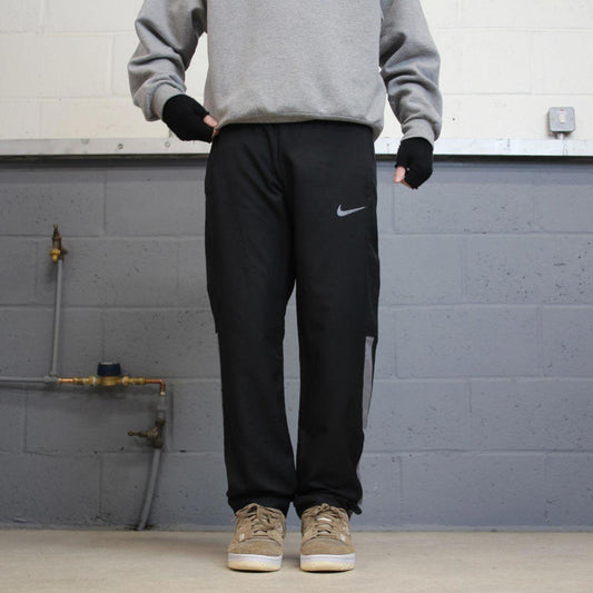 00s Nike tracksuit bottoms y2k S loose black joggers print Swoosh logo gym wear trackies