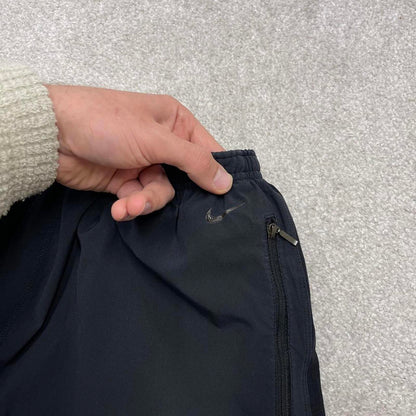 Black Nike trackies XL loose y2k style joggers print Swoosh logo track pants side stripes