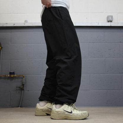 Nike Y2K tracksuit bottoms black Loose floaty mesh lined swoosh logo track pants