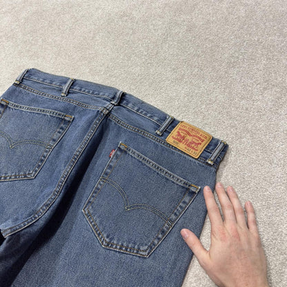 Y2K Levi’s 505 jeans W42L32 blue 100% cotton straight fit 5 pocket belt loops red tab logo