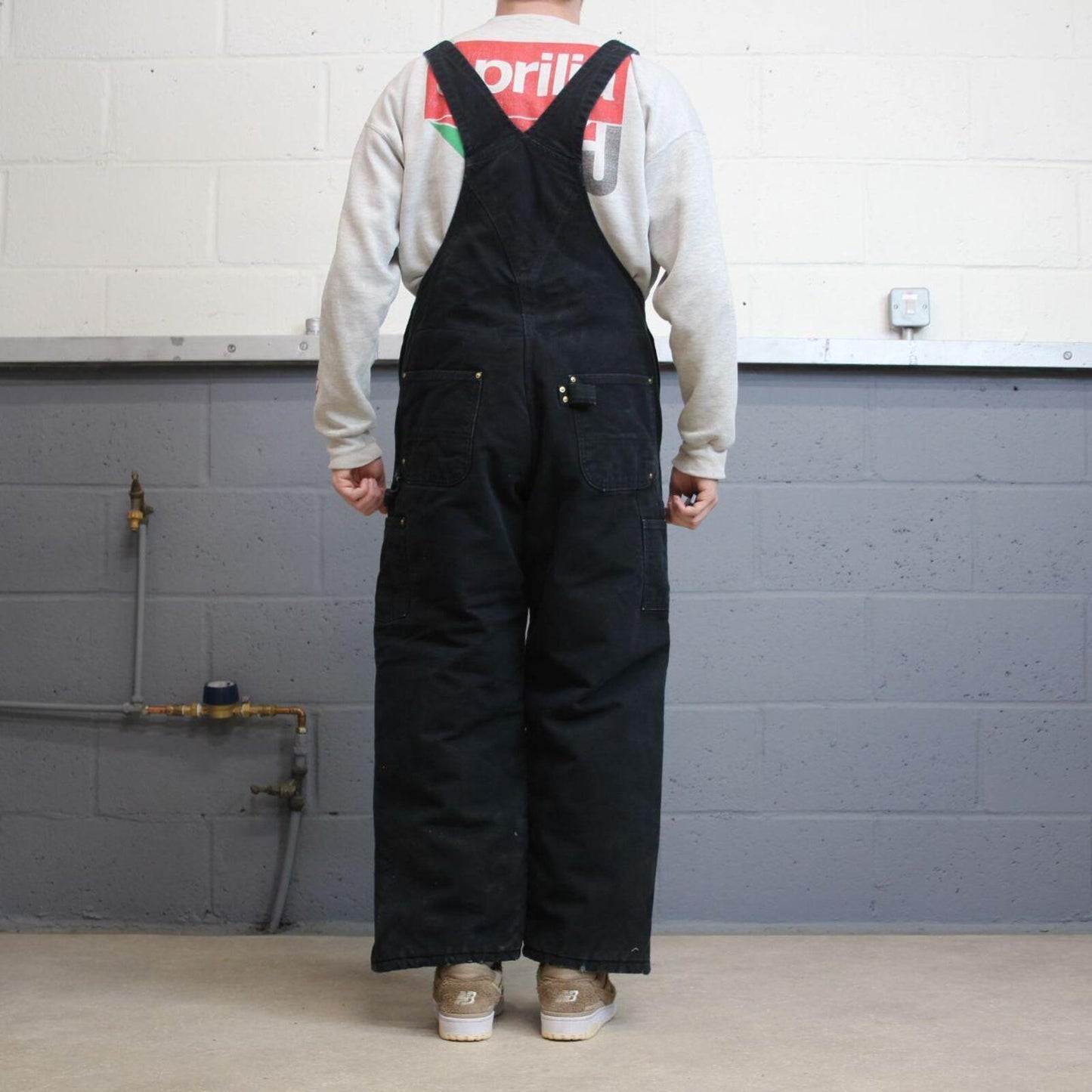 Vintage y2k Carhartt dungarees loose leg faded black Canvas quilt lined bib & brace overalls