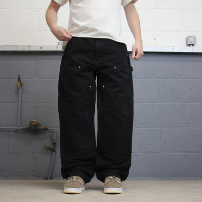 Black Carhartt double knee carpenter jeans W34L34 90s style thick canvas loose leg skater cargos
