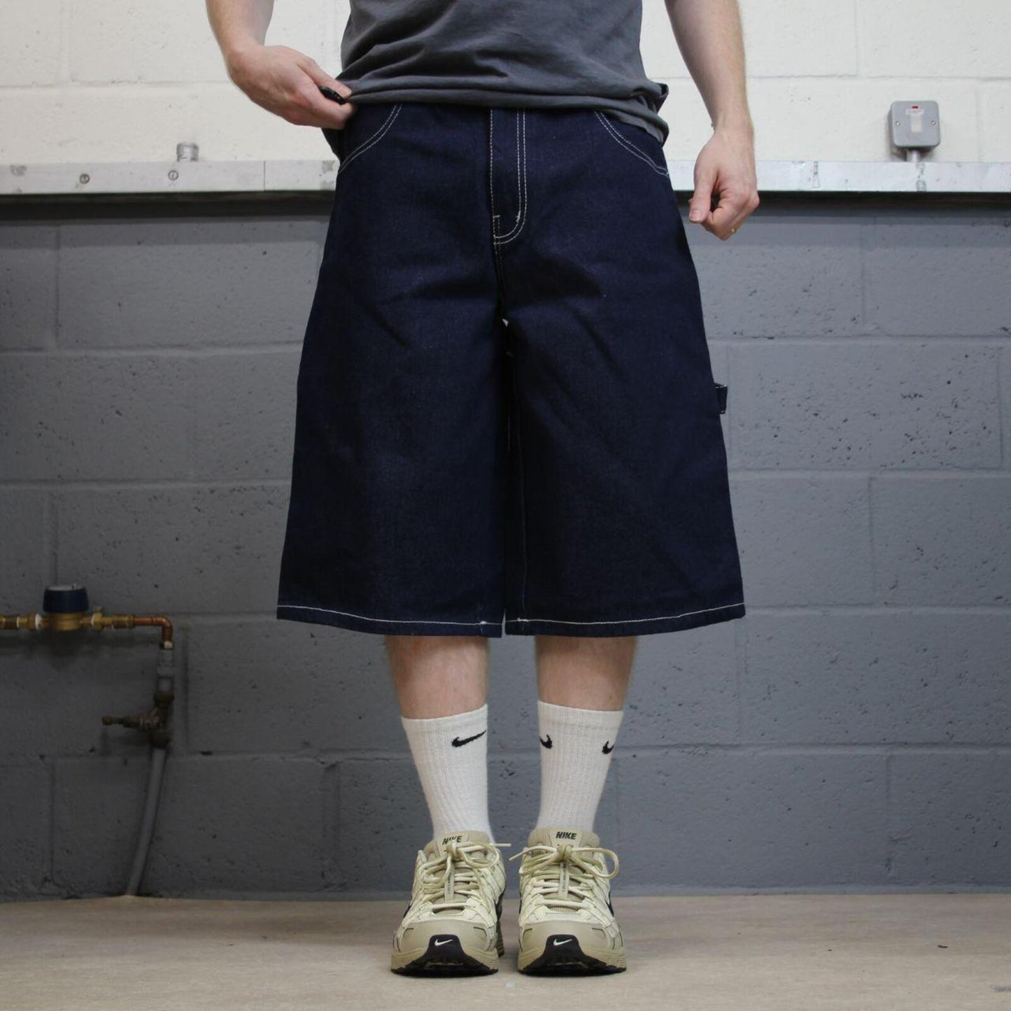 Baggy denim carpenter shorts y2k navy blue Thick denim cargo festival shorts with FUBU details