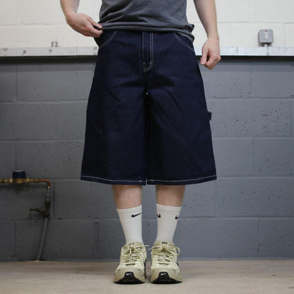Baggy denim carpenter shorts y2k navy blue Thick denim cargo festival shorts with FUBU details