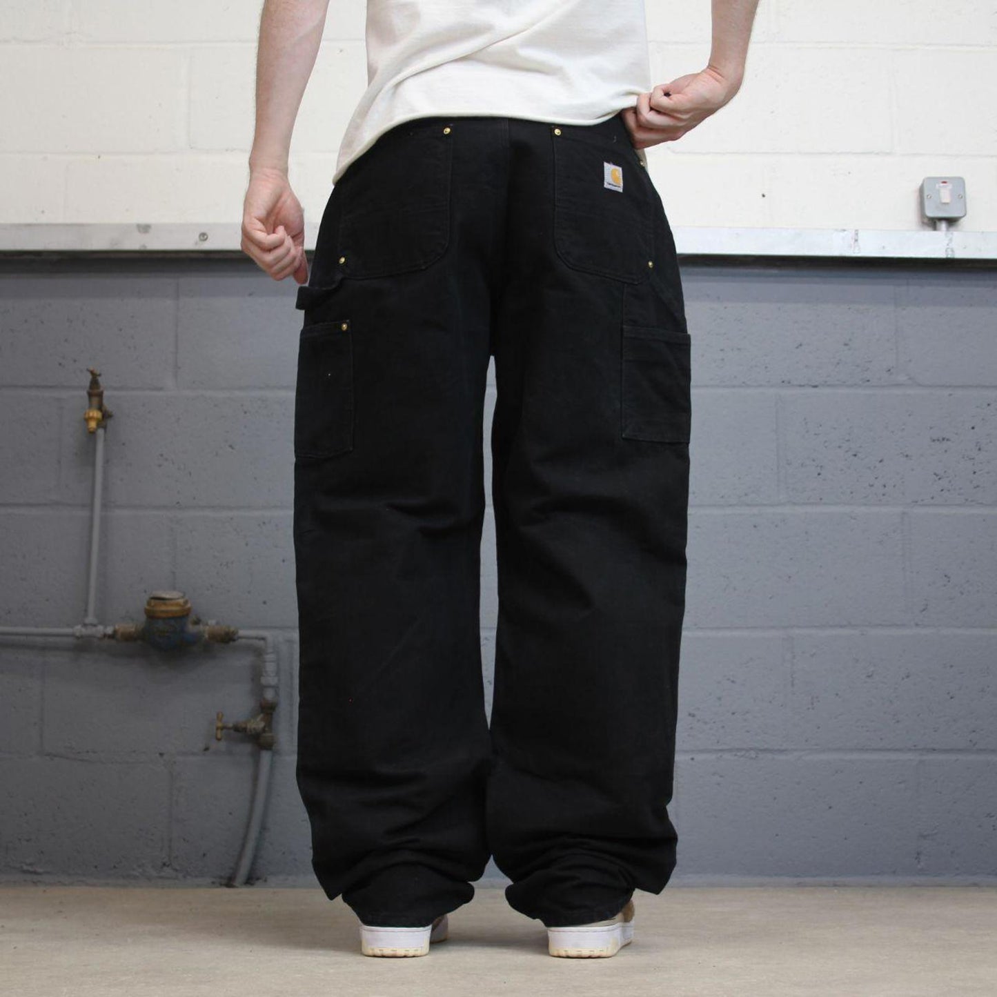 Black Carhartt double knee carpenter jeans W34L34 90s style thick canvas loose leg skater cargos