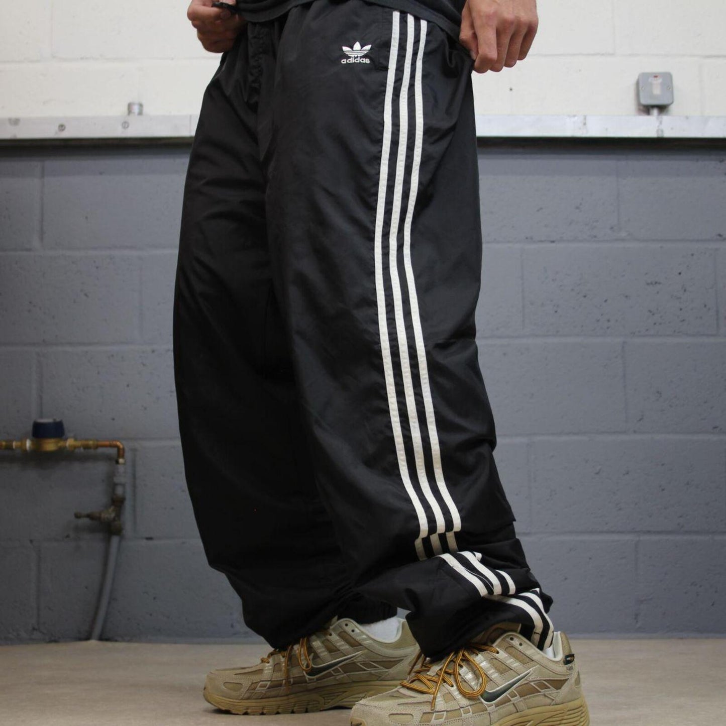 Vintage Adidas tracksuit bottoms loose black Loose floaty embroidered side stripe track pants