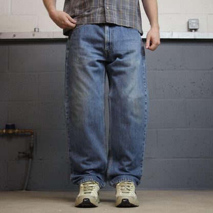Levi’s 550 denim jeans y2k W36L30 blue loose straight leg red tab logo pants