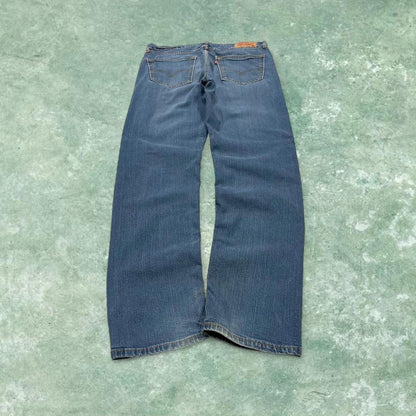 Vintage y2k Levi's 505 jeans blue Straight leg denim pants red tab logo
