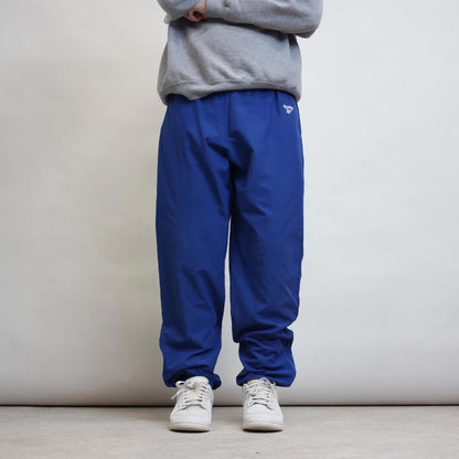 Blue vintage Reebok tracksuit bottoms L