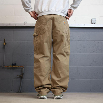 Carhartt carpenter jeans work pants Khaki brown W38L32 Relaxed fit skate style workwear trousers