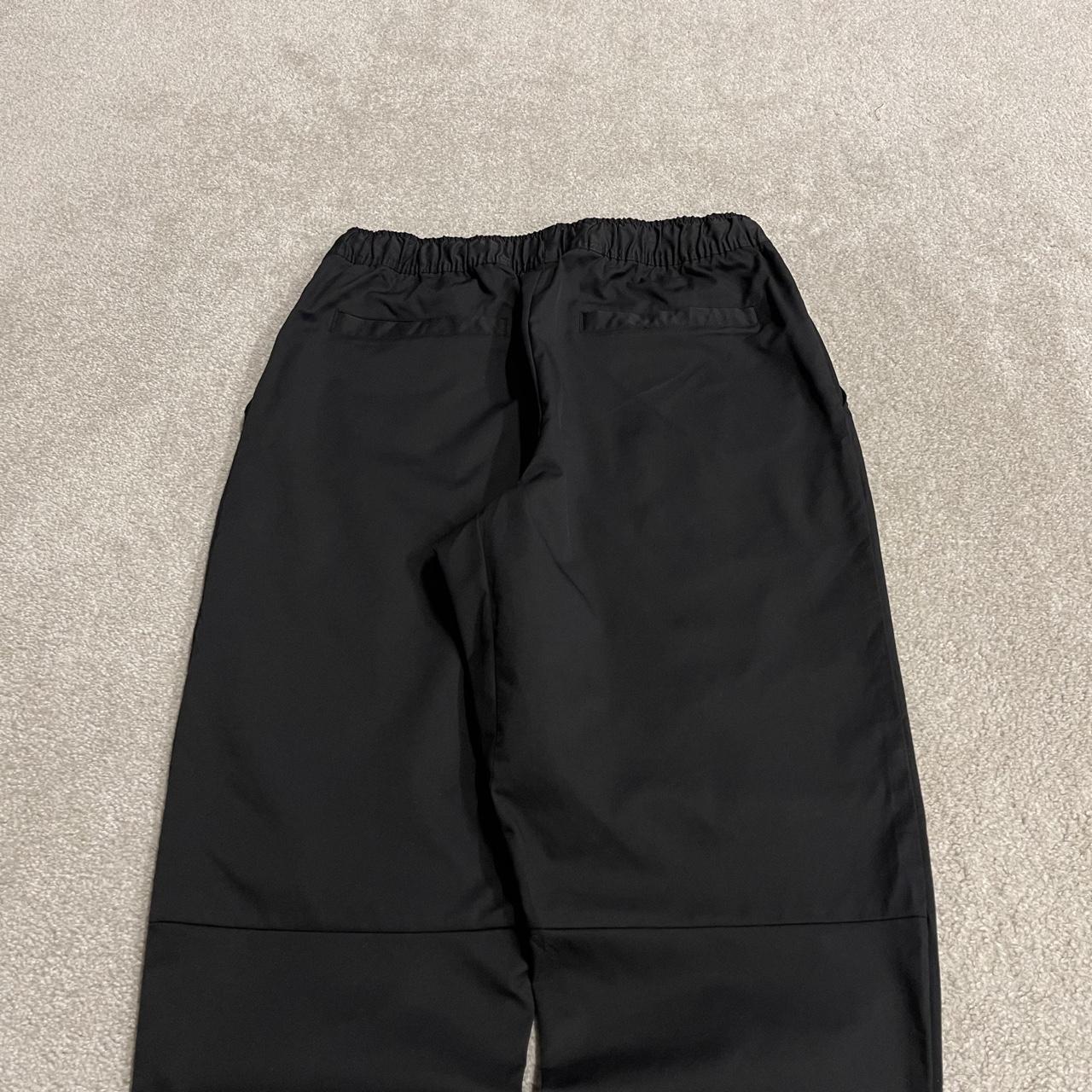 Y2K Nike technical tracksuit bottoms black Ulined track pants with embroidered logo