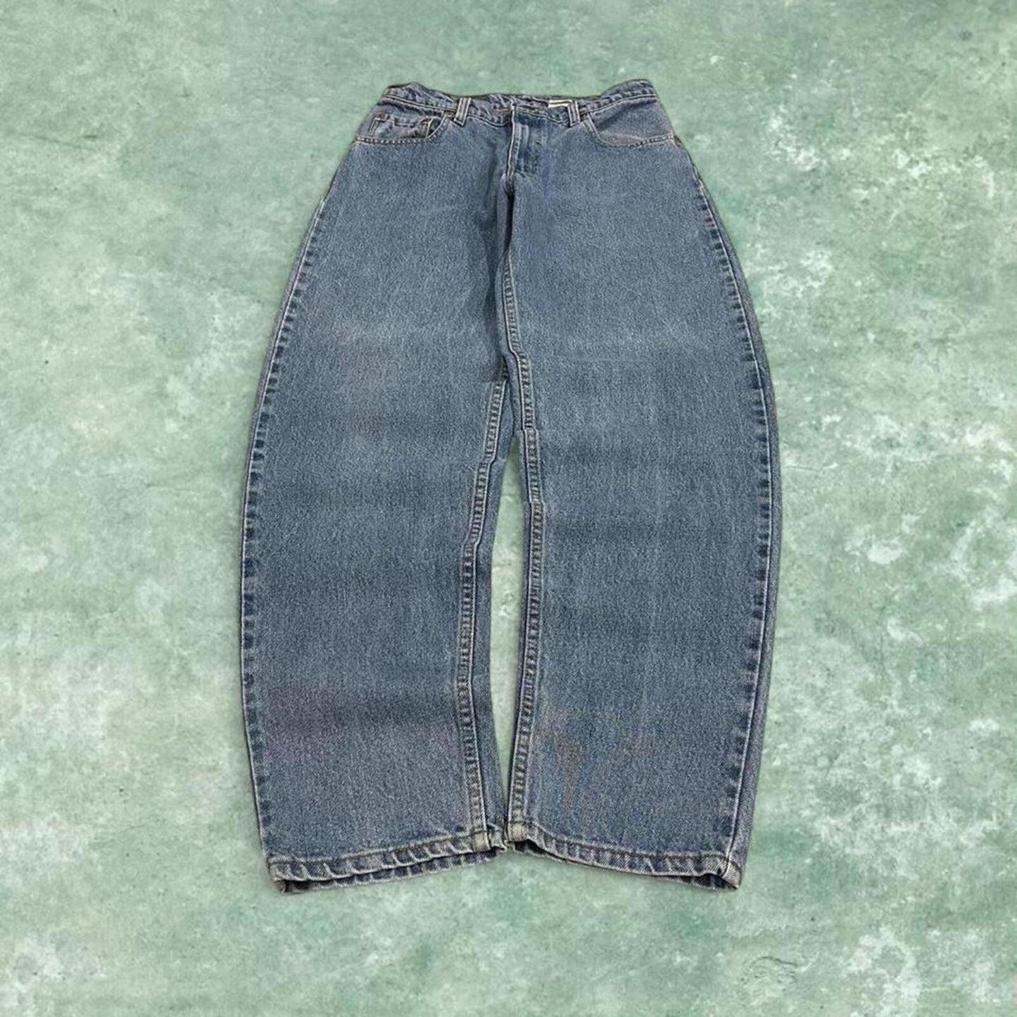 Vintage Levi's jeans 560 loose fit tapered leg blue USA made 100% cotton denim pants red tab logo