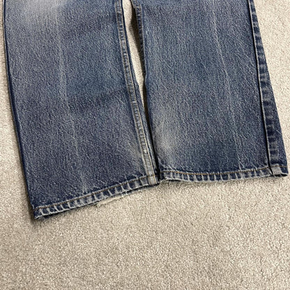 Y2K Levi’s 505 jeans blue starched denim W34L29 100% cotton straight fit 5 pocket belt loops red tab